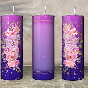 May include: Three stainless steel tumblers with a purple ombre design. The tumblers feature a floral design with pink and white flowers and gold glitter accents.