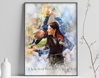 May include: A framed watercolor print featuring a mother and child in a playful pose. The artwork has a soft, colorful aesthetic with the text "A boys first true love is his mother" at the bottom. The frame is black.