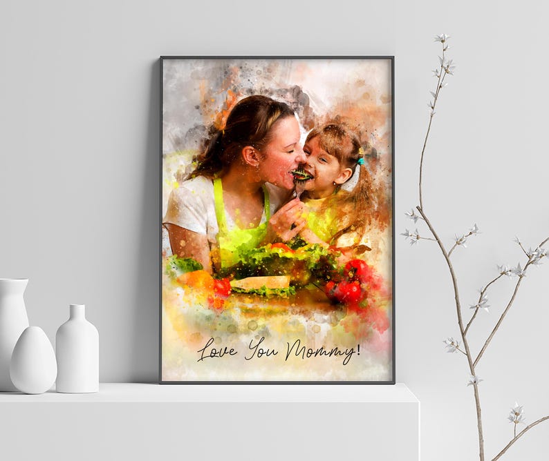 May include: A watercolor painting of a mother and daughter sharing a meal. The mother is wearing a yellow apron and the daughter is wearing a pink shirt. The painting is set against a background of colorful vegetables and the text "Love You Mommy!" is written in the bottom right corner.