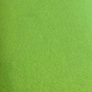 May include: A solid green felt fabric with a slightly textured surface.