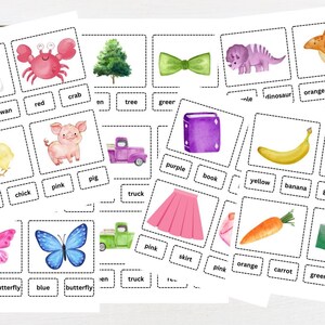 Może przedstawiać: Zestaw drukowanych kart edukacyjnych z kolorowymi ilustracjami zwierząt, przedmiotów i jedzenia. Każda karta zawiera obrazek i odpowiadające mu słowo, takie jak "łabędź", "krab", "drzewo", "ciężarówka", "książka", "banan", "sałata", "spódnica", "marchewka" i "motyl".