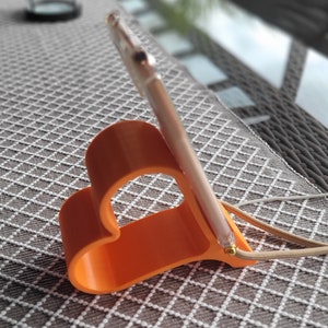 Phone stand mobile phone holder mobile phone tray charging station smartphone holder in heart design with charging cable function