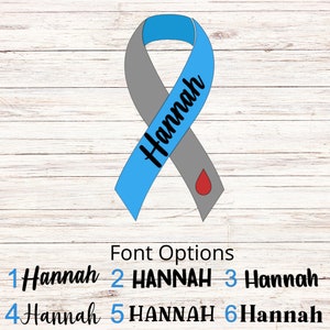 May include: A awareness ribbon split vertically into light blue and gray sections. The name Hannah is written in black script across the blue side, and a small red teardrop shape sits on the gray side. Below, six numbered font style options.