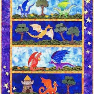 May include: A colorful quilt featuring four rows of fantasy scenes. Each row depicts dragons in various colors, including blue, green, orange, and yellow, with trees and a castle. The quilt has a blue border with gold stars.