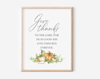 May include: A printable art print with a white background and a framed image of a fall-themed design with pumpkins and leaves. The text reads "Give thanks to the Lord, for he is good: his love endures forever. Psalm 136."