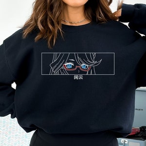 May include: Black sweatshirt with a white outline of anime-style eyes wearing red-rimmed glasses, with blue irises. The Japanese characters "闲云" are below the eyes. The sweatshirt is a solid black colour.