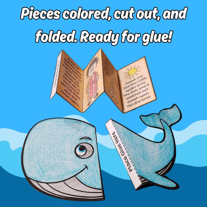 May include: A paper craft project featuring a light blue whale cut into two sections with a "Place Glue Here" tab, and an accordion-folded booklet with illustrations and text from Jonah 2:10. The text reads: "Pieces colored, cut out, and folded. Ready for glue!"