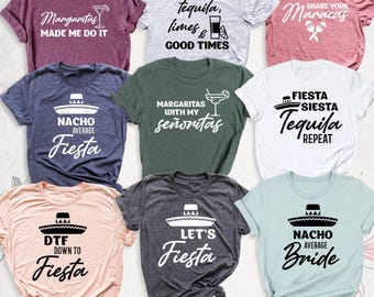 May include: A collection of nine short-sleeved t-shirts in various colors including maroon, light gray, pink, navy, dark green, white, peach, charcoal, and light blue, each featuring unique white or black graphic text and icons.