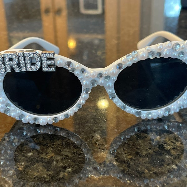 Free Shipping! Retro 50’s white round sunglasses with rhinestone bling and pearls.