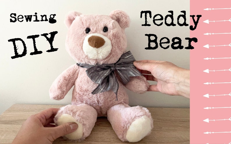 May include: A pink teddy bear with a grey and white bow tie. The bear is sitting on a wooden surface. The text "Sewing DIY Teddy Bear" is visible in the background.