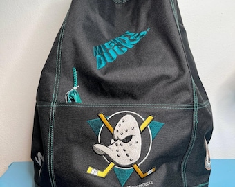 Mochila vintage de los Mighty Ducks de los años 90, Anaheim, NHL, color verde azulado y negro, bolsa con el logotipo, stock muerto