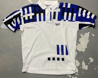 Polo Reebok vintage de los 90, estampado abstracto azul y blanco, estilo streetwear retro, talla grande.