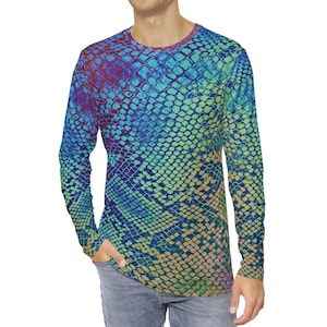 May include: A long-sleeved shirt with a colourful snake skin pattern. The shirt is blue, green, yellow, and pink.