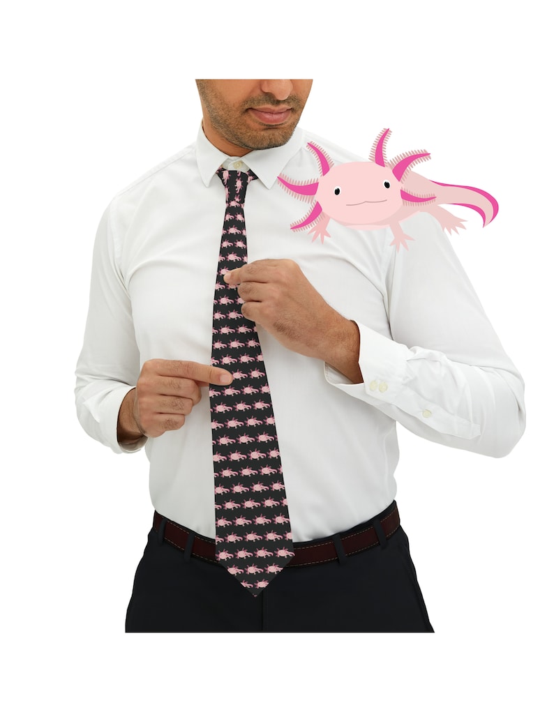 May include: A black tie with a pink axolotl pattern. The axolotl is a pink amphibian with feathery gills.