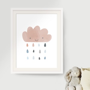 May include: A white framed print with a pink cloud with a smiling face and blue, gray, and orange raindrops falling from it.