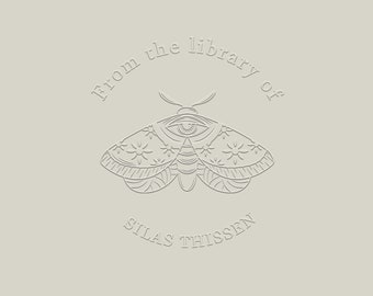 May include: A black and white illustration of a moth with an eye in the centre of its body. The text "From the library of Silas Thissen" is written around the moth.