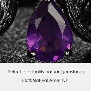 May include: A close-up of a dark purple amethyst gemstone set in a black metal crown. The text "Select top quality natural gemstones 100% Natural Amethyst" is visible below the image.