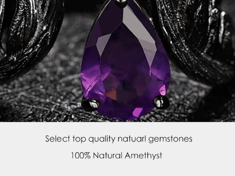 May include: A close-up of a dark purple amethyst gemstone set in a black metal crown. The text "Select top quality natural gemstones 100% Natural Amethyst" is visible below the image.