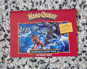 May include: A red box with the title "HeroQuest" and the words "Barbarian Quest Book" and "The Frozen Horror". The box features an illustration of a barbarian fighting a monster in a snowy landscape. The text "10 More Quests Inside" is also visible on the box.
