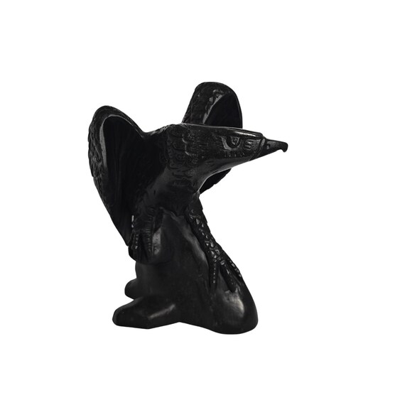 Figurine of a bird of prey made from black natural stone