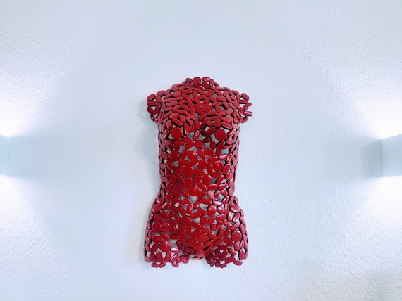 Women's torso made of metal for hanging
