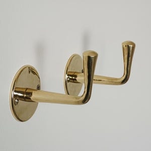 unlacquered brass 2 wall hooks