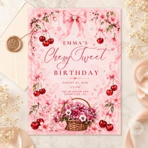 May include: A pink birthday invitation featuring the text "EMMA'S Cherry Sweet BIRTHDAY". The design incorporates cherries, flowers, and a basket of flowers. The date is August 22, 2026, and the time is 2-5 PM.