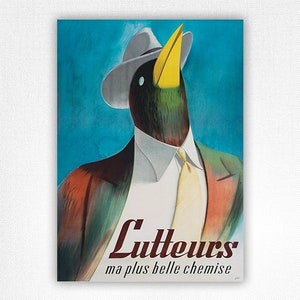 以下が含まれることがあります： 「Lutteurs」シャツのヴィンテージ広告で、帽子とスーツを着て黄色いネクタイをした漫画の鳥が描かれています。テキストは「Lutteurs ma plus belle chemise」です。