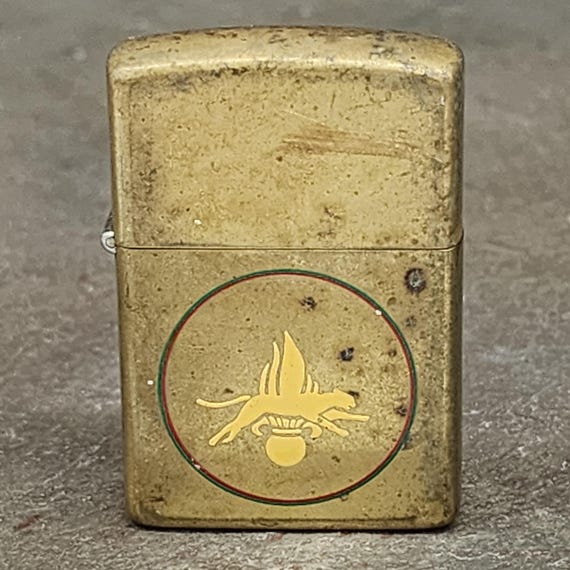 insignia cigarette lighter 1992 Brass Cased Zippo Cigarette Lighter Military Insignia Style Graphics  Cougar