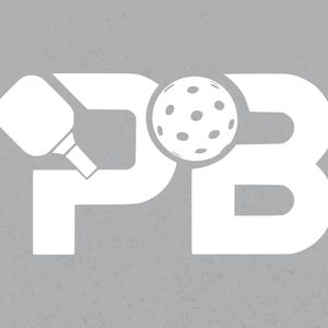 May include: White silhouette of the letters "PB" with a white paddle and a white pickleball in the center.