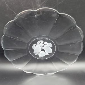 May include: A rustic wooden sign with the text "Welcome to our home" in white lettering. The sign features a distressed finish and a simple, inviting design, perfect for front door decor.