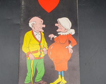 May include: A cartoon illustration of an elderly couple with a red heart above them. The man wears a yellow cardigan, green pants, and holds a cane. The woman is in an orange dress and yellow shoes. The background is black.