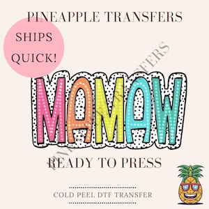 May include: A colorful iron-on transfer design that says "Mamaw" in a retro style with black polka dots. The design is ready to press and is a cold peel DTF transfer.