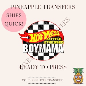 May include: A red, white, and black iron-on transfer with a Hot Wheels logo and the text "Hot Mess A Little Stressed Boymama". The transfer is ready to press and is a cold peel DTF transfer.