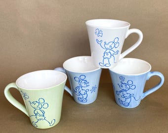 Set of four (4) Vintage Mickey and Minnie ceramic mugs blue green white