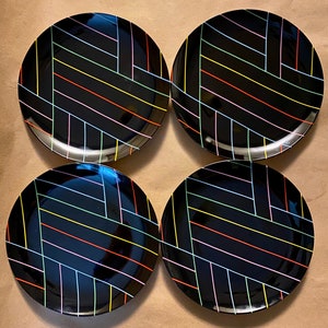 Set of four (4) Fitz and Floyd “Neon Stripe” fine porcelain dessert plates