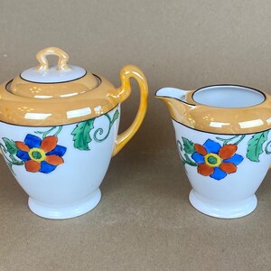 Vintage Meito China luster ware sugar bowl and creamer set, Japan