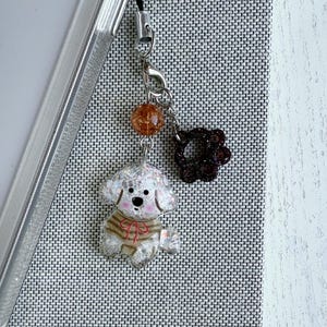Charm per telefono a forma di barboncino a strisce scintillanti con zampa marrone, ciondolo per telefono a forma di zampa in resina fatta a mano, ciondolo per telefono a forma di cagnolino, regalo per cellulare, iPhone, borsa