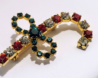 Rhinestone Christmas Candy Cane Brooch Pin with Bow Multicolor Circa 1980s