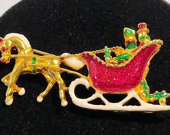 Broche de Noël vintage en émail et strass, traîneau tiré par des chevaux, vers les années 1980