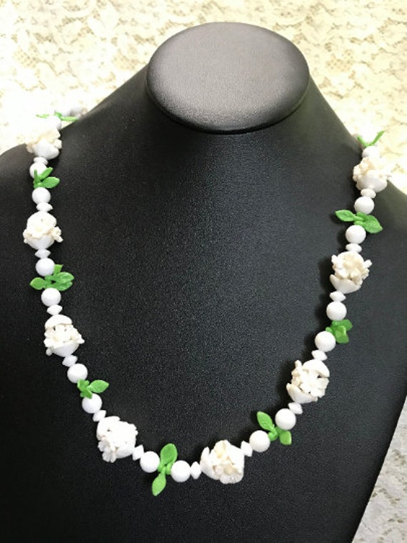 34” Lucite Floral Necklace White with Green Leaves