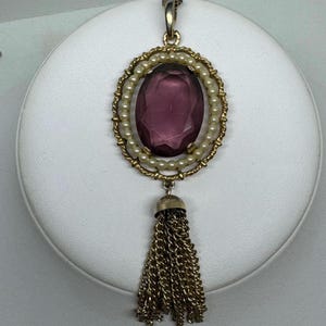 Vintage 70s Avon Tassel Pendant Necklace Large Faceted Amethyst Color Glass Pendant Faux Seed Pearls Goldtone