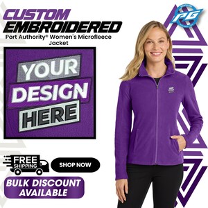 May include: A purple microfleece jacket with a zipper closure and two pockets. The jacket has the text "CUSTOM EMBROIDERED" and "YOUR DESIGN HERE" on the left side. The image also includes the text "FREE SHIPPING" and "SHOP NOW".