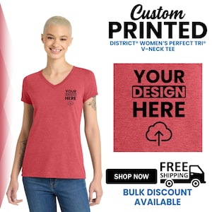 May include: A red V-neck tee shirt with the text "YOUR DESIGN HERE" and a cloud graphic. The image also includes the text "Custom PRINTED" and "DISTRICT WOMEN'S PERFECT TRI V-NECK TEE".