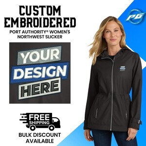 May include: Black hooded jacket with a zipper closure and a drawstring waist. The jacket has a small embroidered logo on the left chest that says "YOUR DESIGN HERE".