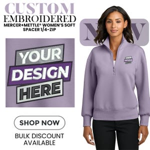 May include: A lavender 1/4-zip sweatshirt with the text "YOUR DESIGN HERE" embroidered on the chest. The image also includes the text "CUSTOM EMBROIDERED" and "SHOP NOW".