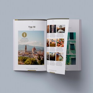 May include: An open book with a list of the top 10 places to visit in Tuscany, Italy. The book features photos of the city of Florence, a bridge, a vineyard, and a plate of food. The text on the page reads "Top 10 Places to Visit in Tuscany".