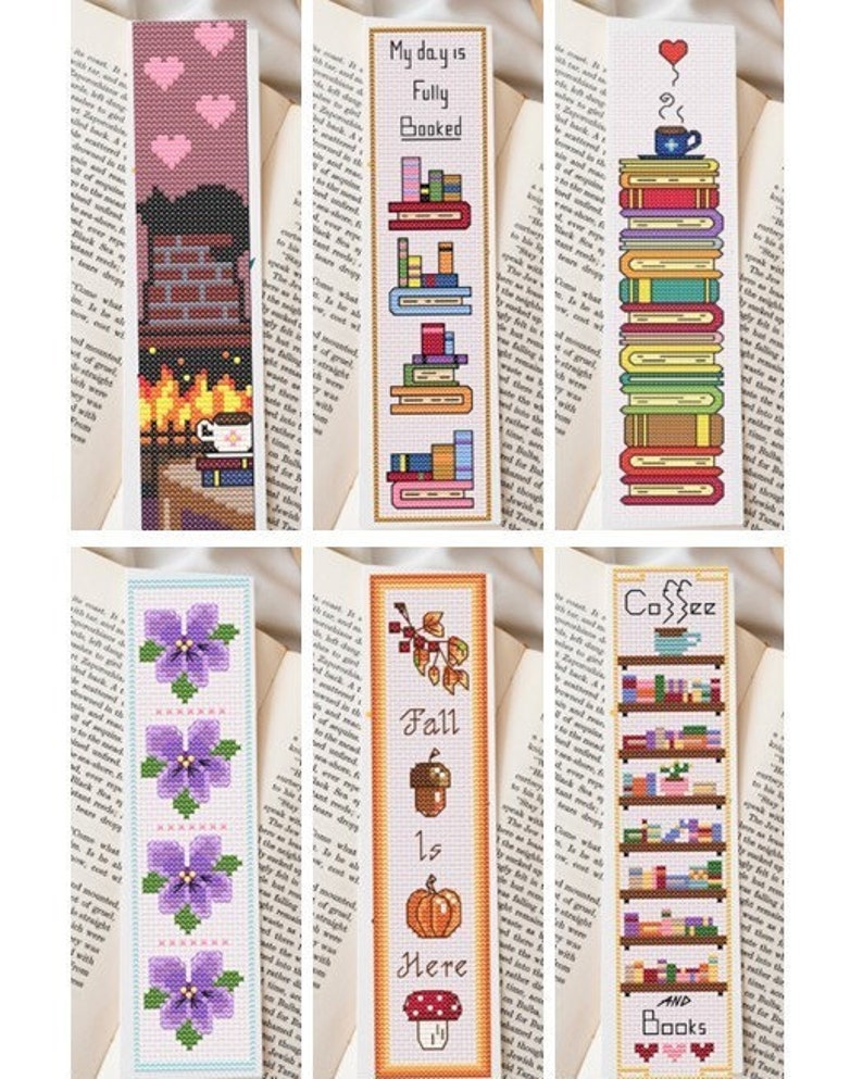 May include: Six different cross-stitch bookmark designs. The designs include a fireplace with a cup of coffee, a stack of books with the text "My day is fully booked", a stack of books with a cup of coffee and a heart, a row of purple flowers, a pumpkin, acorn, and mushroom with the text "Fall is here", and a bookshelf with books and the text "Coffee and books".