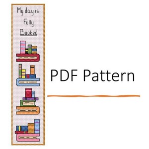 May include: Cross stitch pattern for a bookmark featuring the text "My day is Fully Booked" and a stack of colourful books. The pattern is in PDF format.