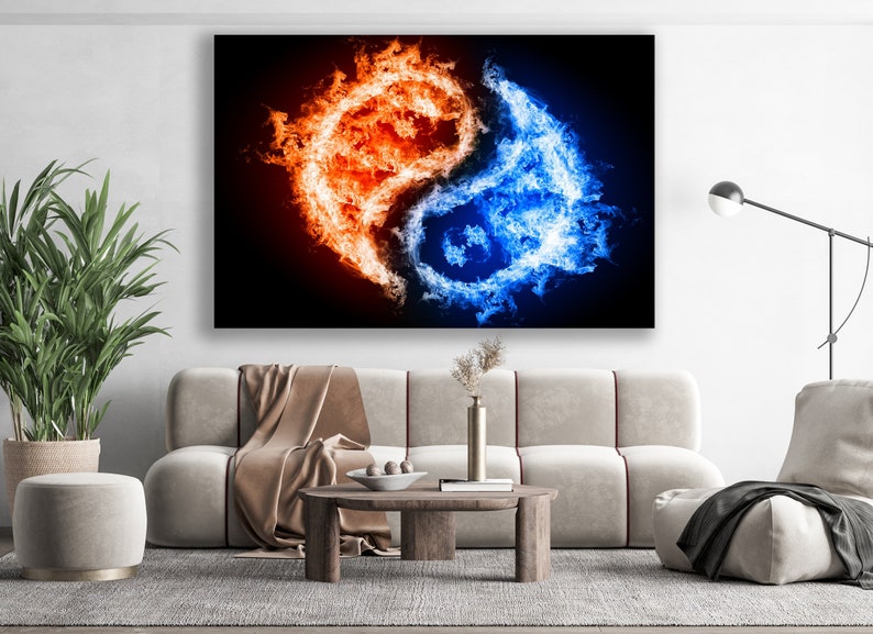 May include: A yin yang symbol made of fire and water. The fire is orange and red, and the water is blue. The background is black.